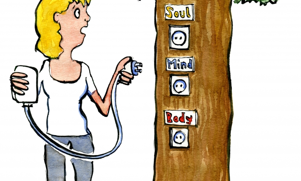 woman plugging her smartphone into a tree